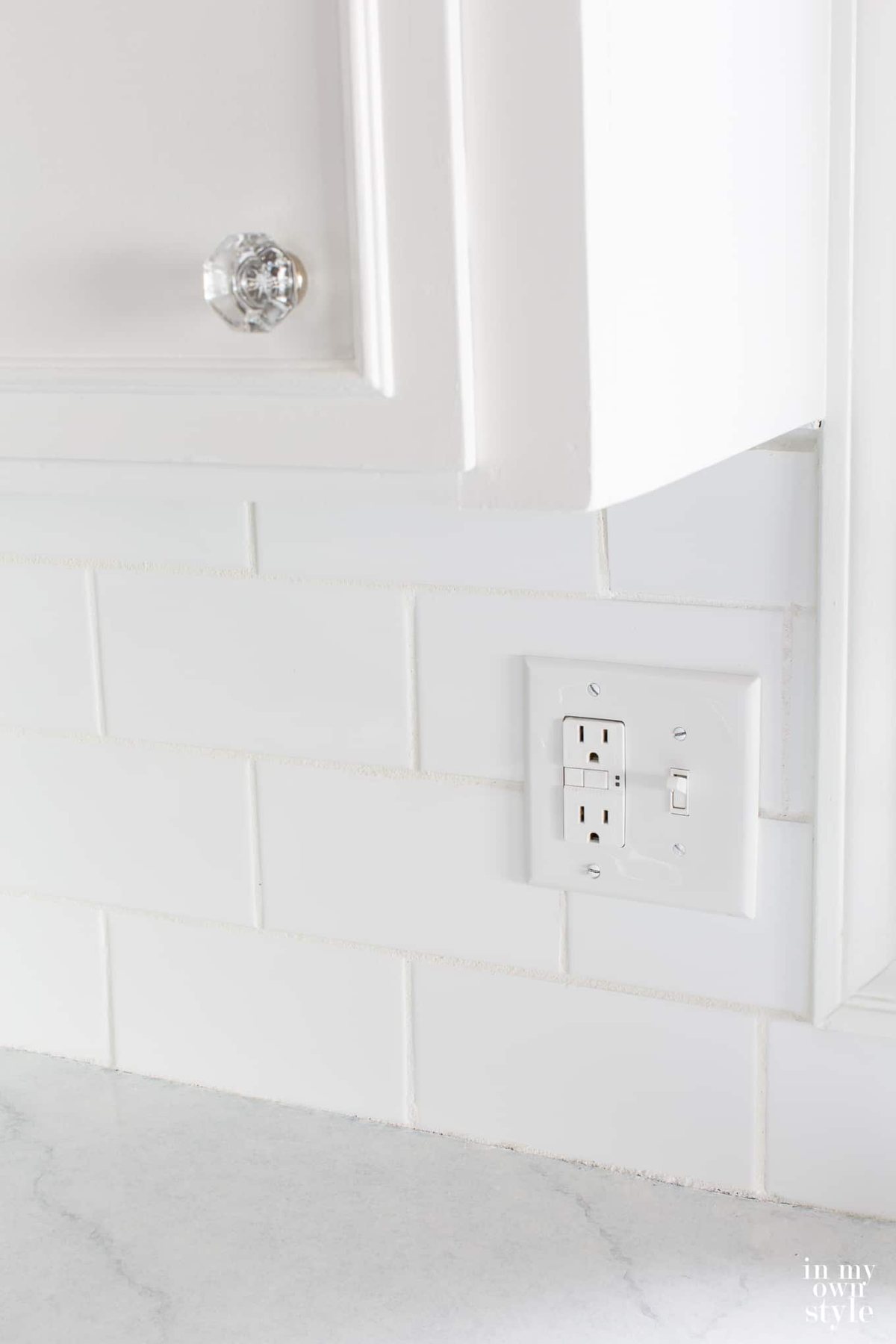 White Subway tiles on kitchen backsplash