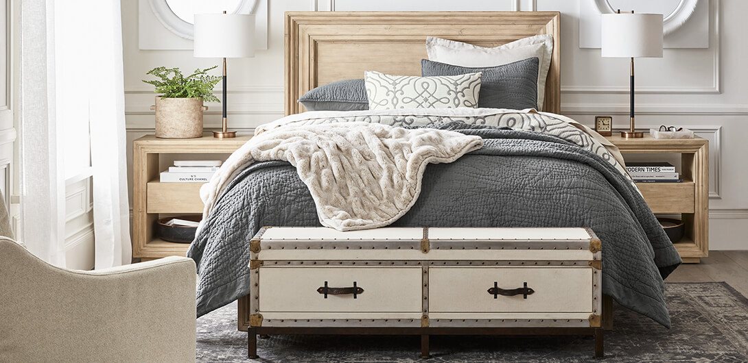 Different ways to style pillows on a bed.