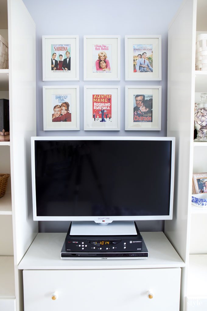 Check out this gallery wall idea using movie DVD case covers...repurposing project