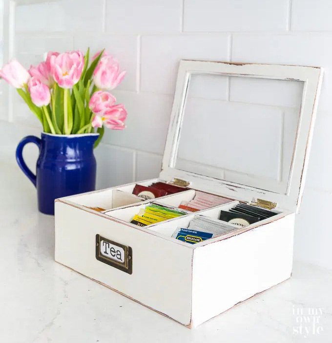 Paint a thrift store box and fill with tea bags to give as a gift.