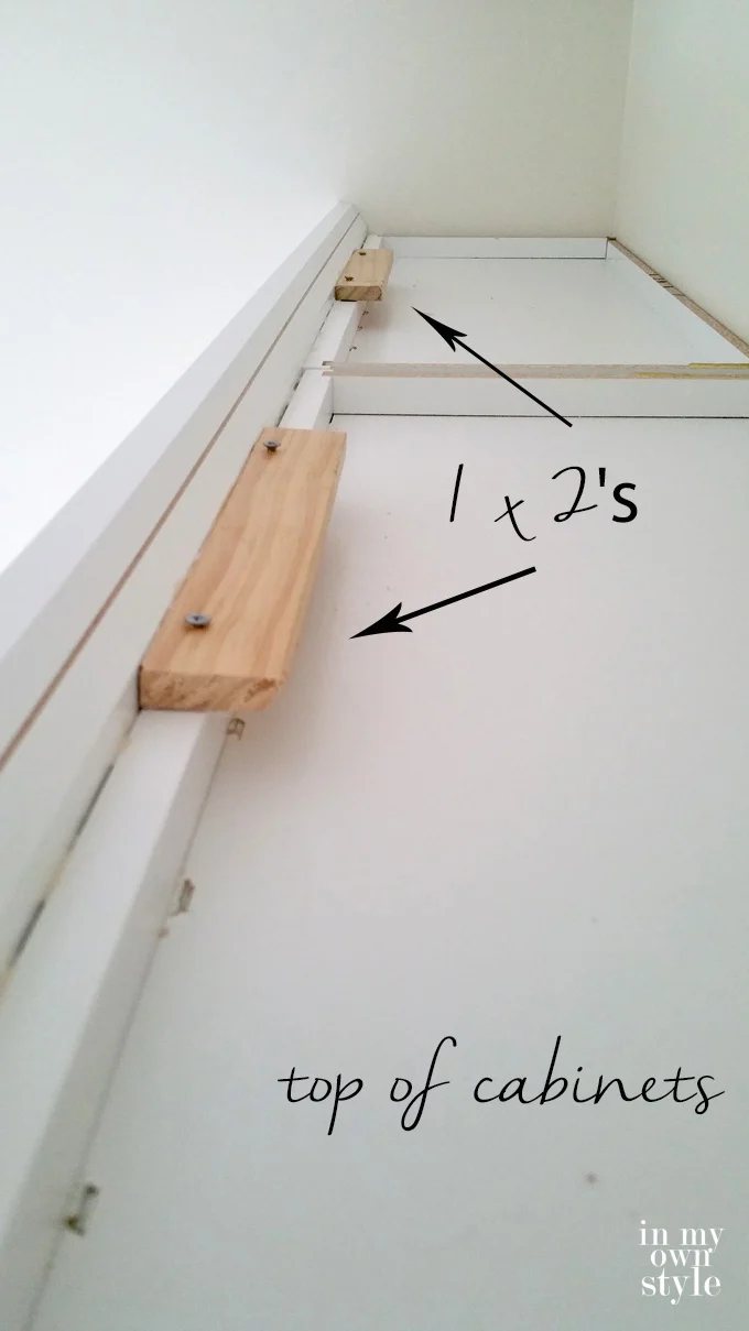 How to attach crown molding to the top of wall cabinets when their is no ceiling