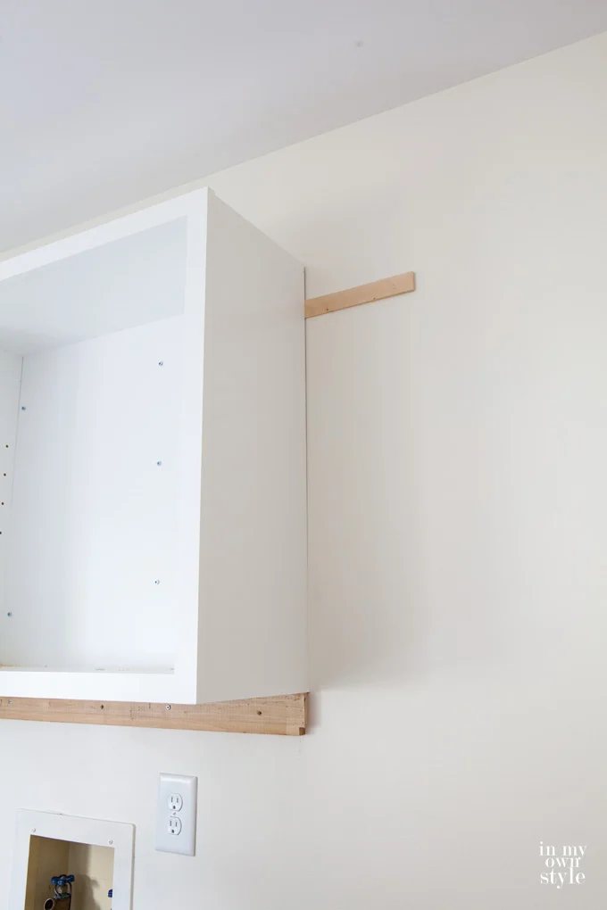 How to hang wall cabinets in a laundry room