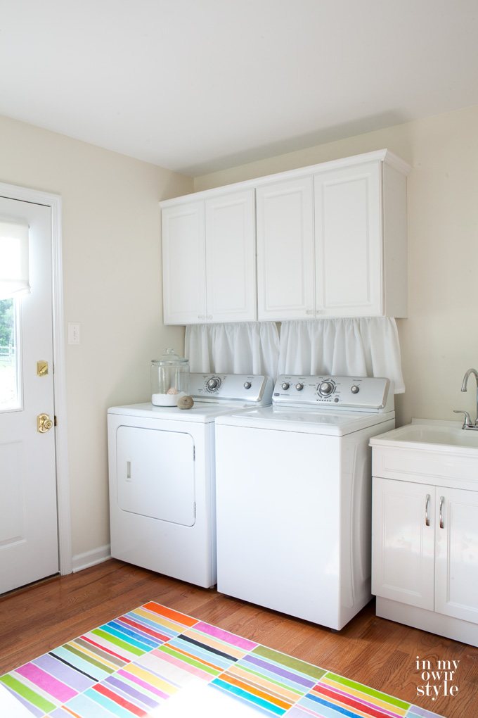 How to hide washer and dryer connections on a wall in a laundry room