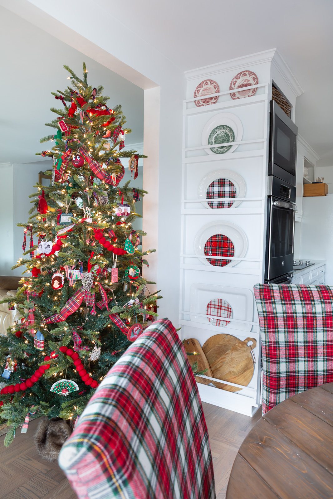 Christmas decorated plate wall in kitchen