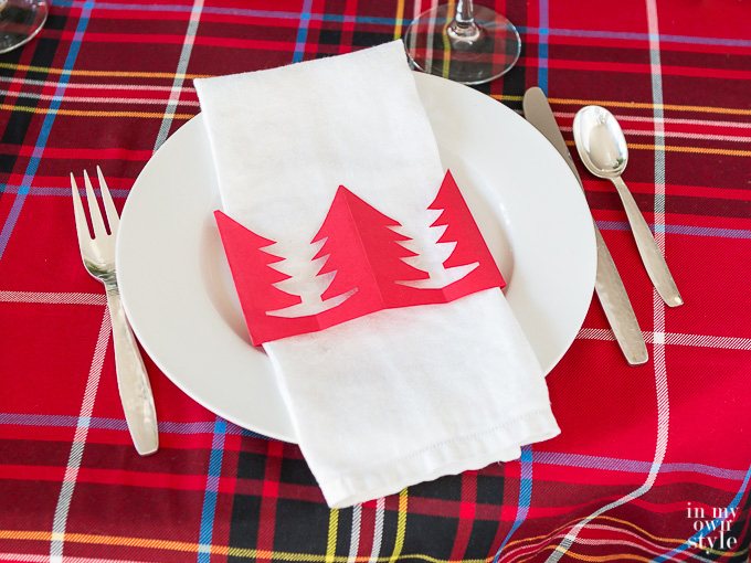 Make simple DIY Christmas tree napkin rings from paper to add a festive touch to your holiday table setting.