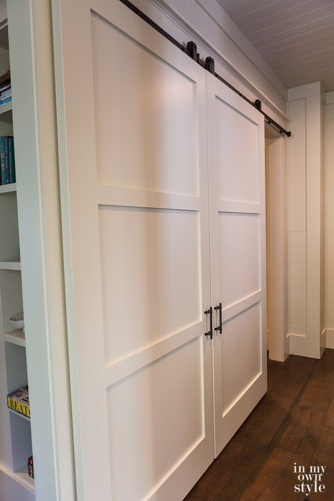 Closed Rolling door closet in hallway of the Southern Living Idea House 2017