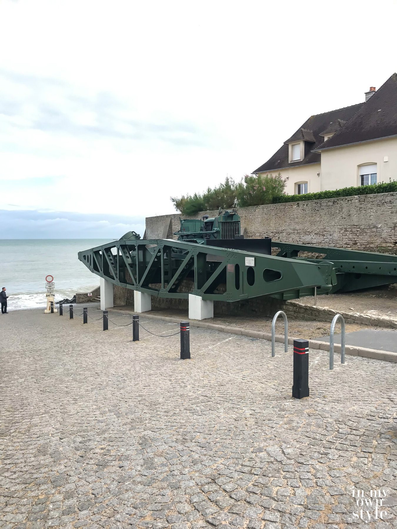 A section of the WW2 protable temporary Mulberry Harbor that moved a huge volume fo troops from landing craft and ships to the beaches at Normandy.