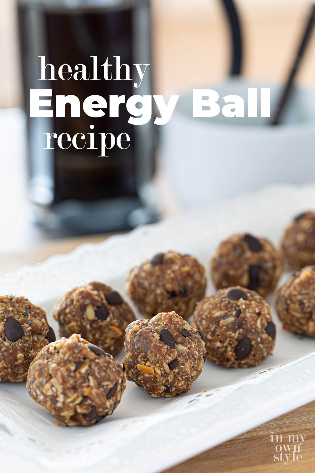 Rows of oatmeal chocolate chip energy balls on a plate. Text overlay says healthy energy ball recipe.