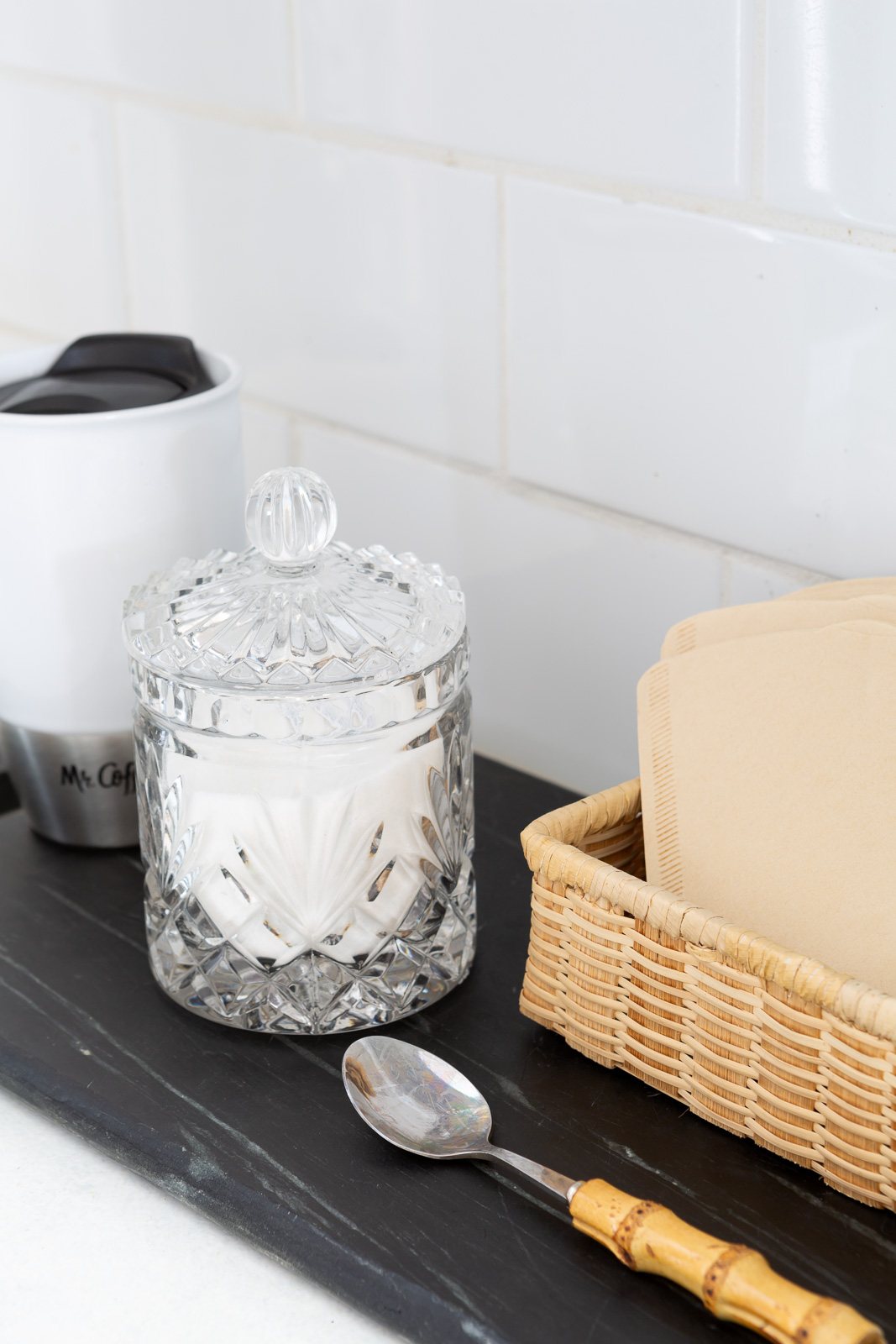 cut crystal sugar bowl on kitchen counter coffee station.