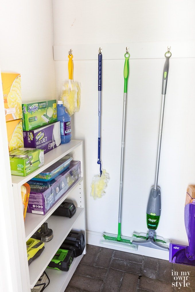 organizing a closet for cleaning tools