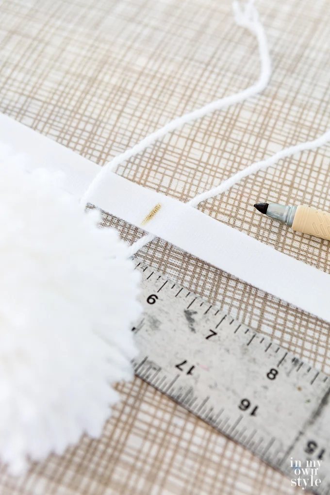 how to use Velcro to attach pom pom trim to a cover for an ottoman