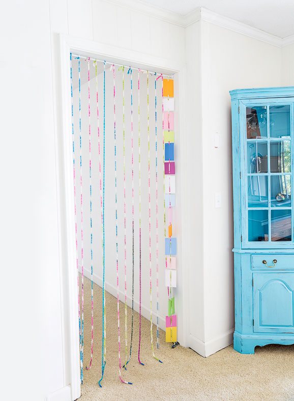 Creative DIY paint chip crafts and decor for a room in your home.