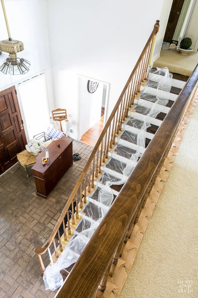 Staircase makeover showing how to paint balusters