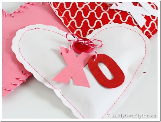 White Valentine heart filled with candy
