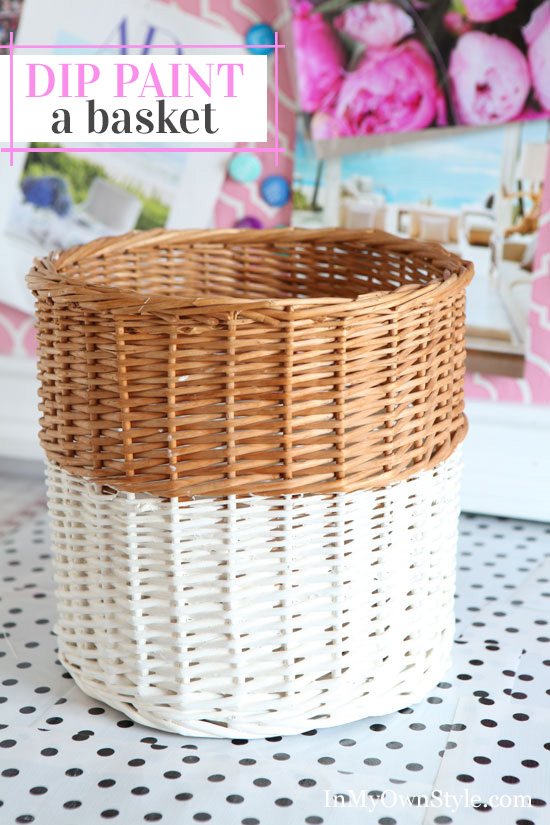 Wicker waste basket that was dipped in white paint to give it a style update.