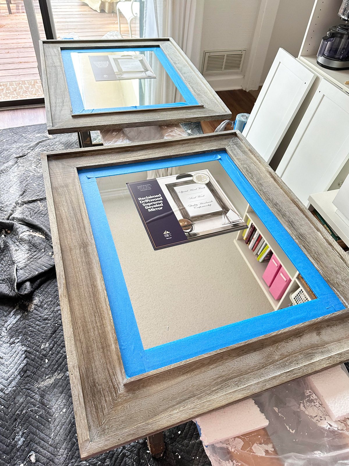 wood framed mirrors being treated with a plaster finish