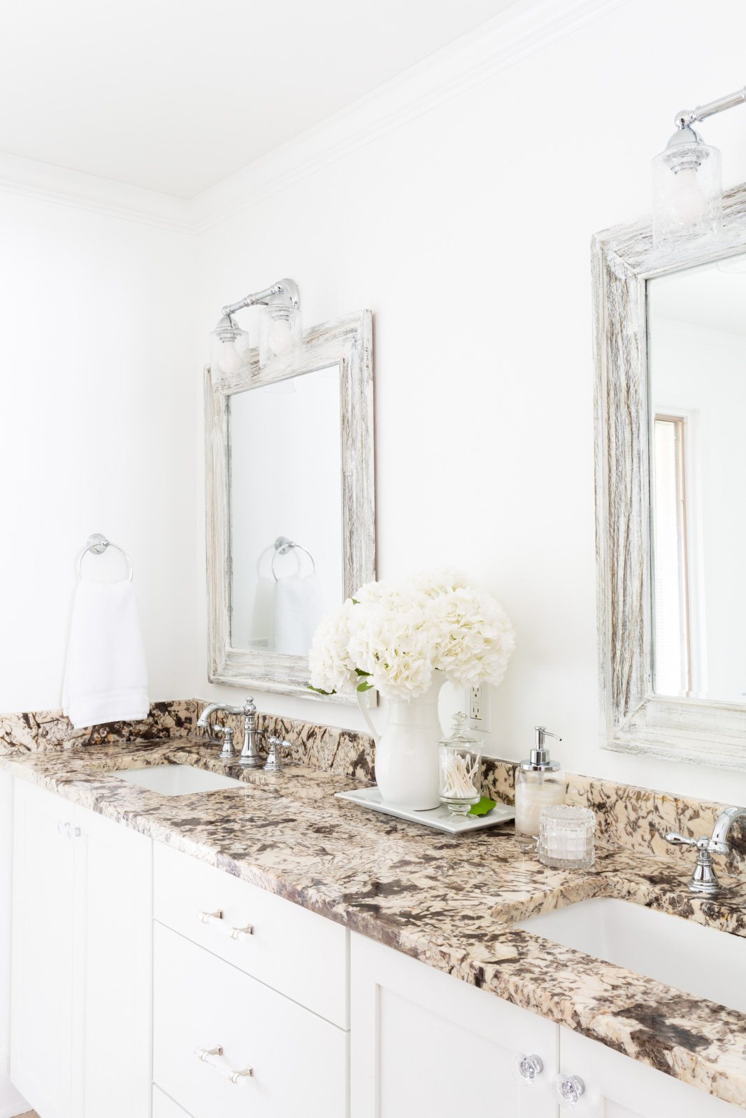 white flowers on bathroom counter