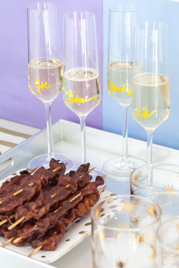 Tray with New Year's Eve Party Finger Food - Spicy Bacon Skewers