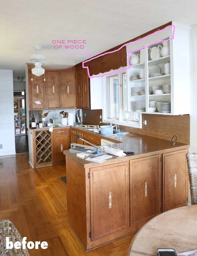 How to update a kitchen by removing the scalloped valance over the sink.