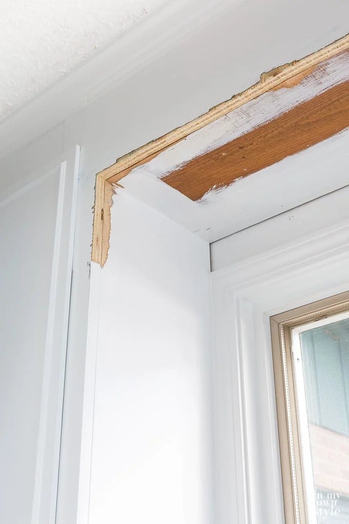 How to remove a wood valance above a sink in an outdated kitchen.