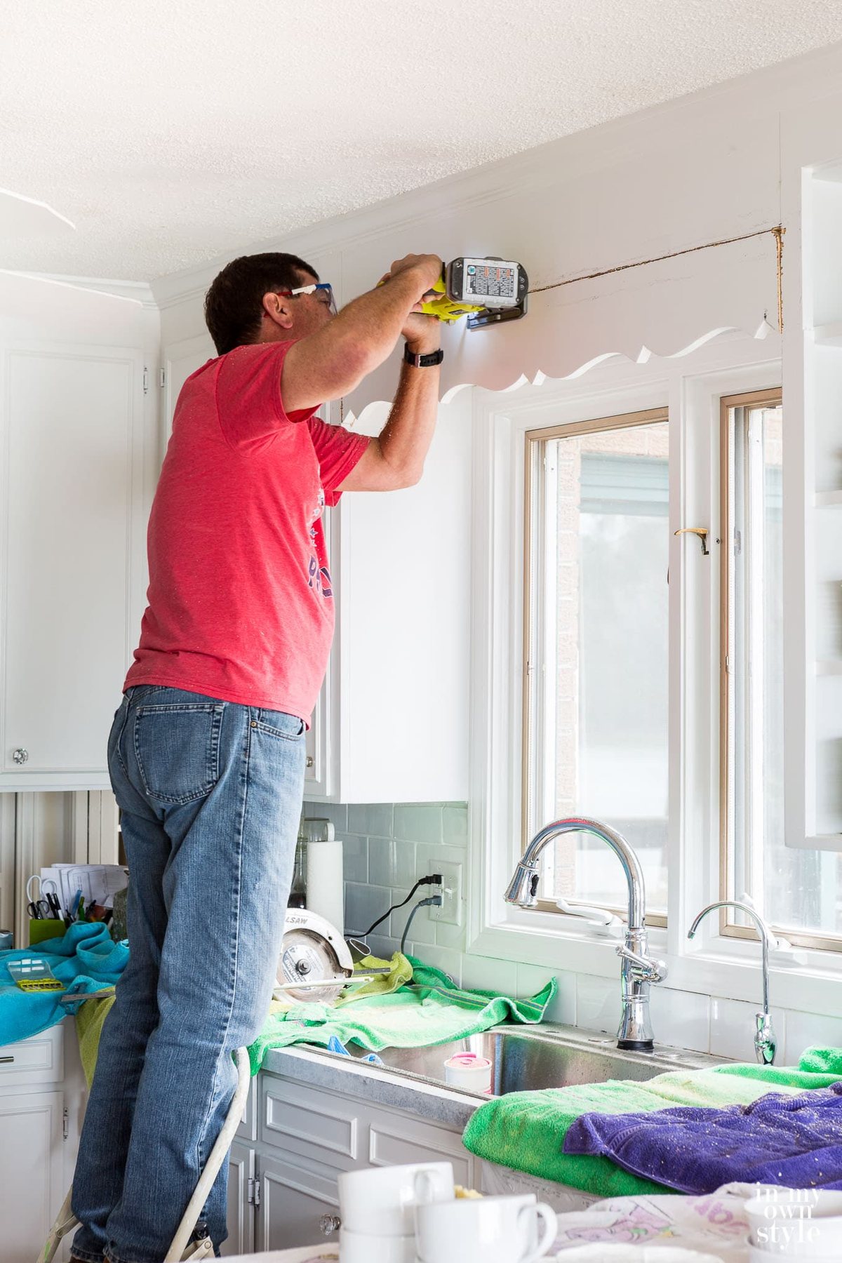 1970's kitchen makeover - how to remove a dated scalloped wood valance over a kitchen sink