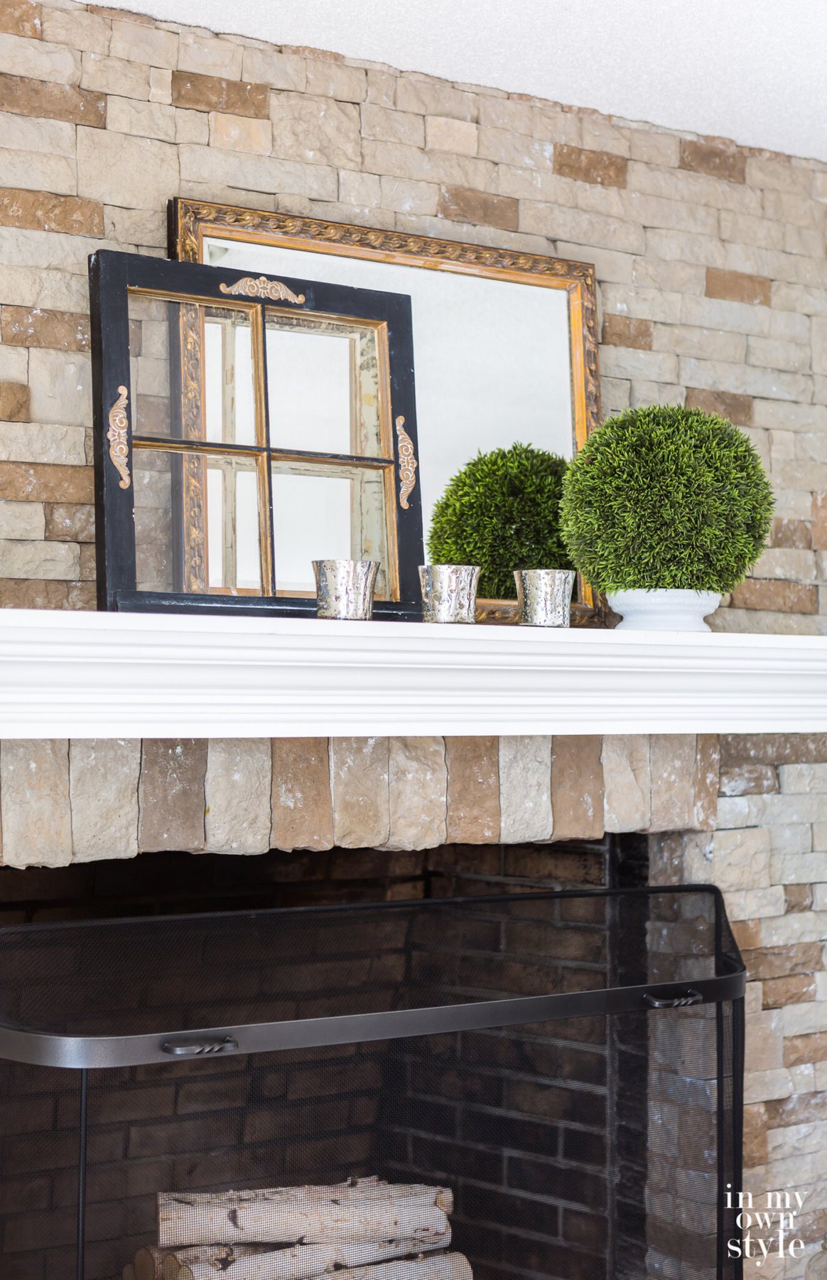 AirStone fireplace and mantel decorated for Winter.