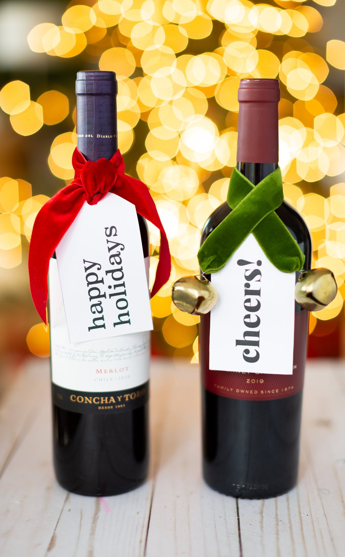 2 wine bottles ready for giving at the holidays