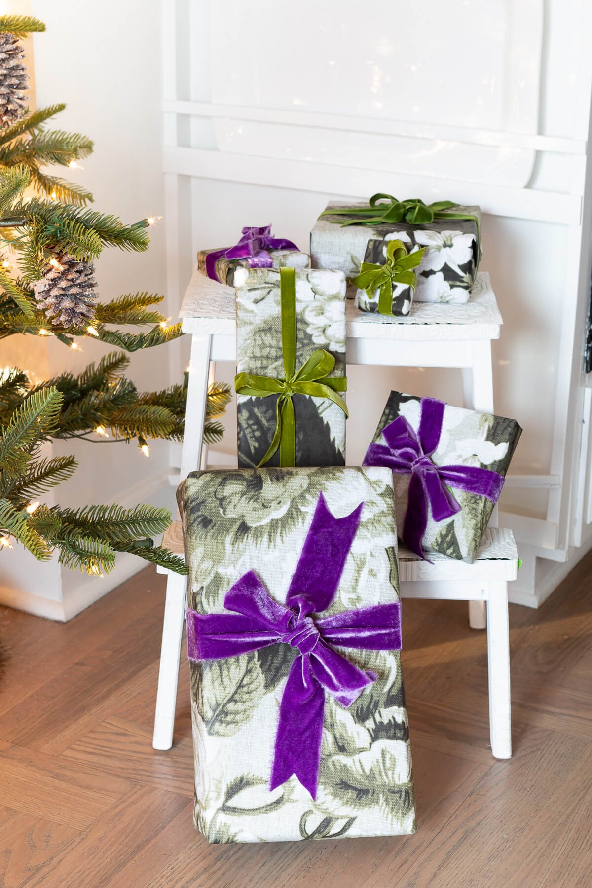 Christmas gifts wrapped on stool