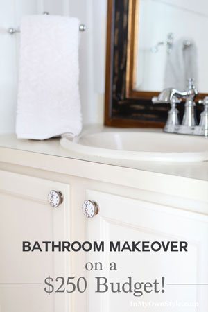 Bathroom-sink-cabinet-makeover-with-clock-face-cabinet-door-knobs