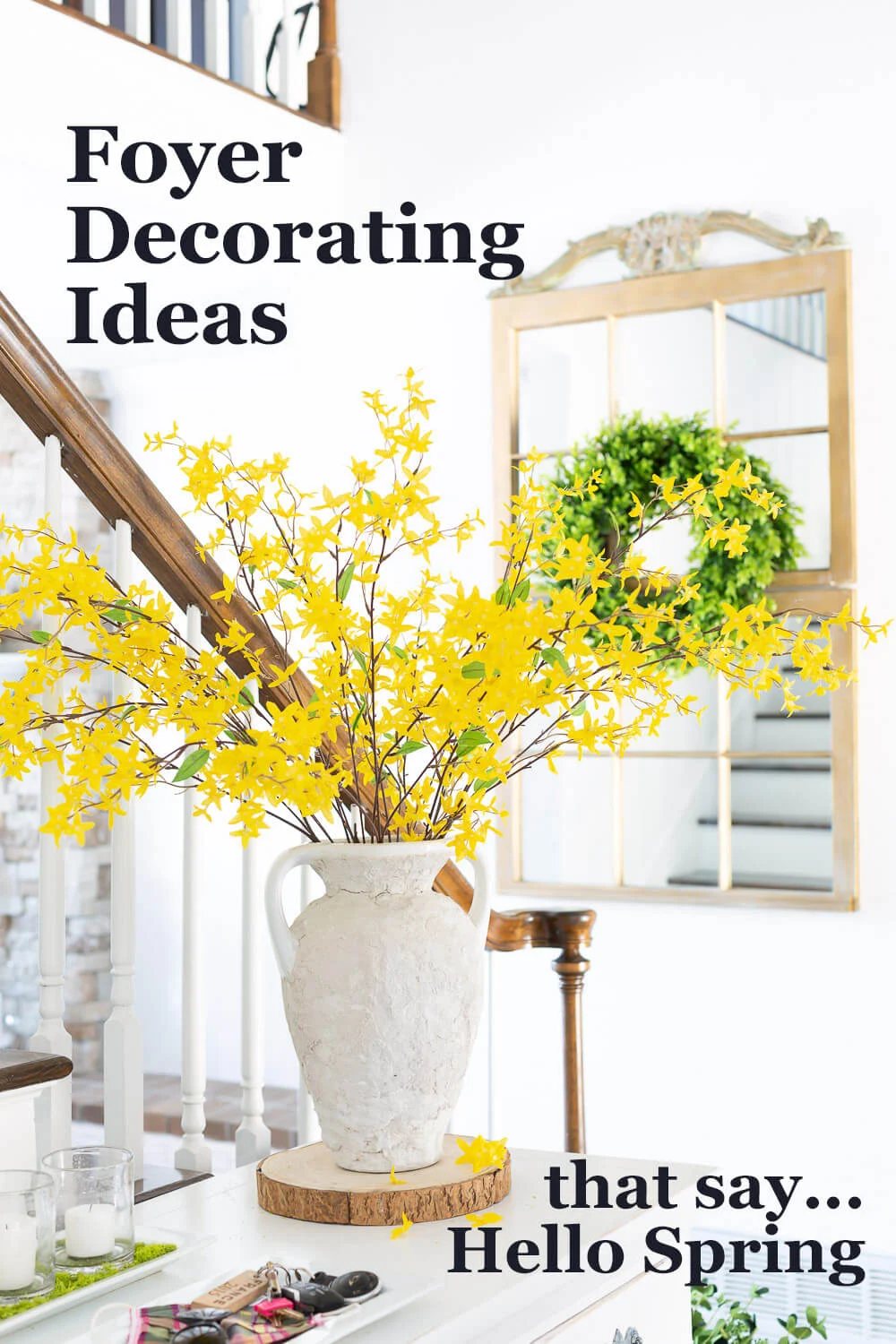 Yellow flowers in large vase on foyer console table. Text overlay says Foyer Decorating ideas that say Hello Spring