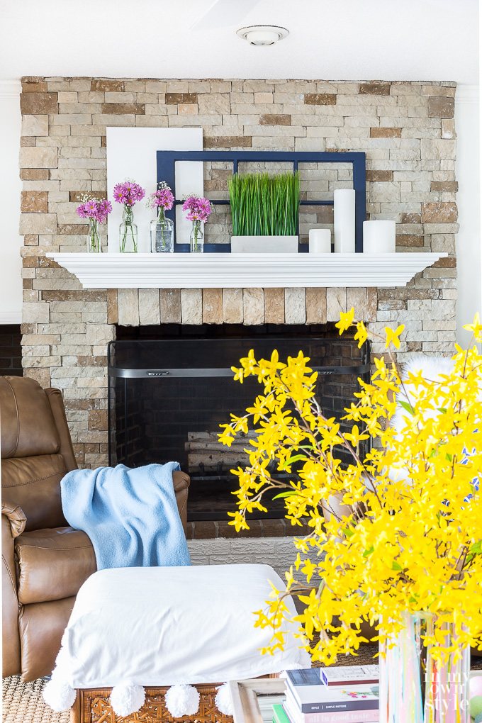 Spring Mantel Decor using repurposed and recycled glass bottles