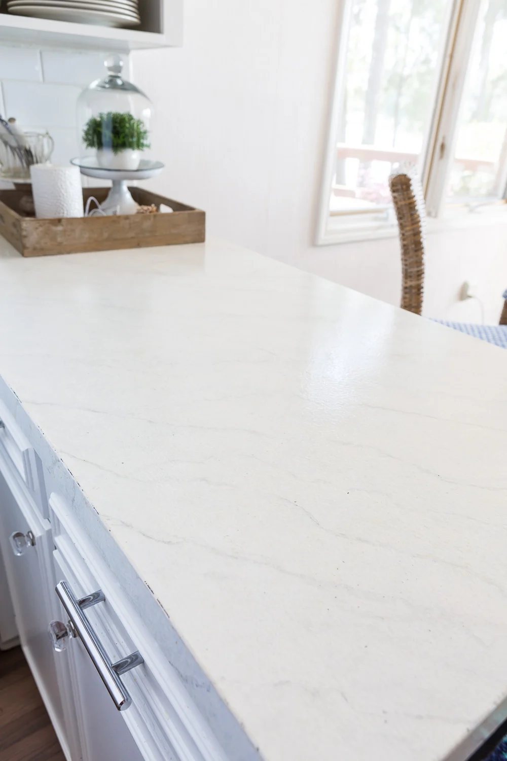 Kitchen counter painted to look like Carrara Marble