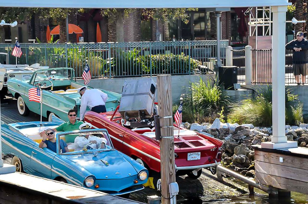 Diane of Oducu blog getting a ride in a vintage Amphicar at Disney Springs in Orlando Florida.