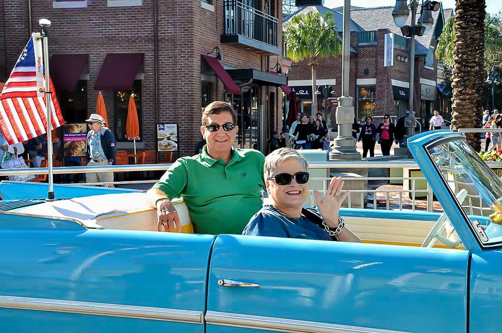 Diane of Oducu blog getting a ride in a vintage Amphicar at Disney Springs in Orlando Florida.
