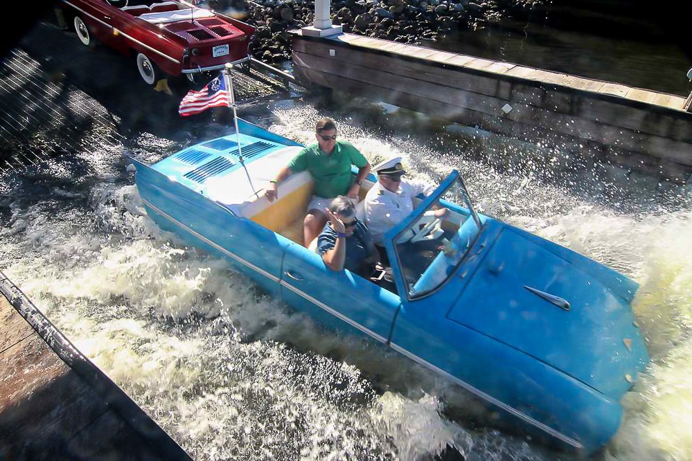 Going into the water from land in a vintage Amphicar