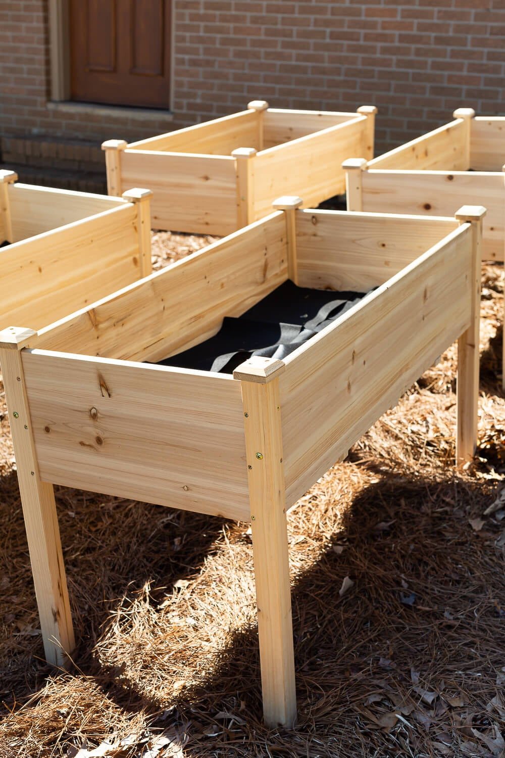 4 elevated cedar outdoor garden planters.