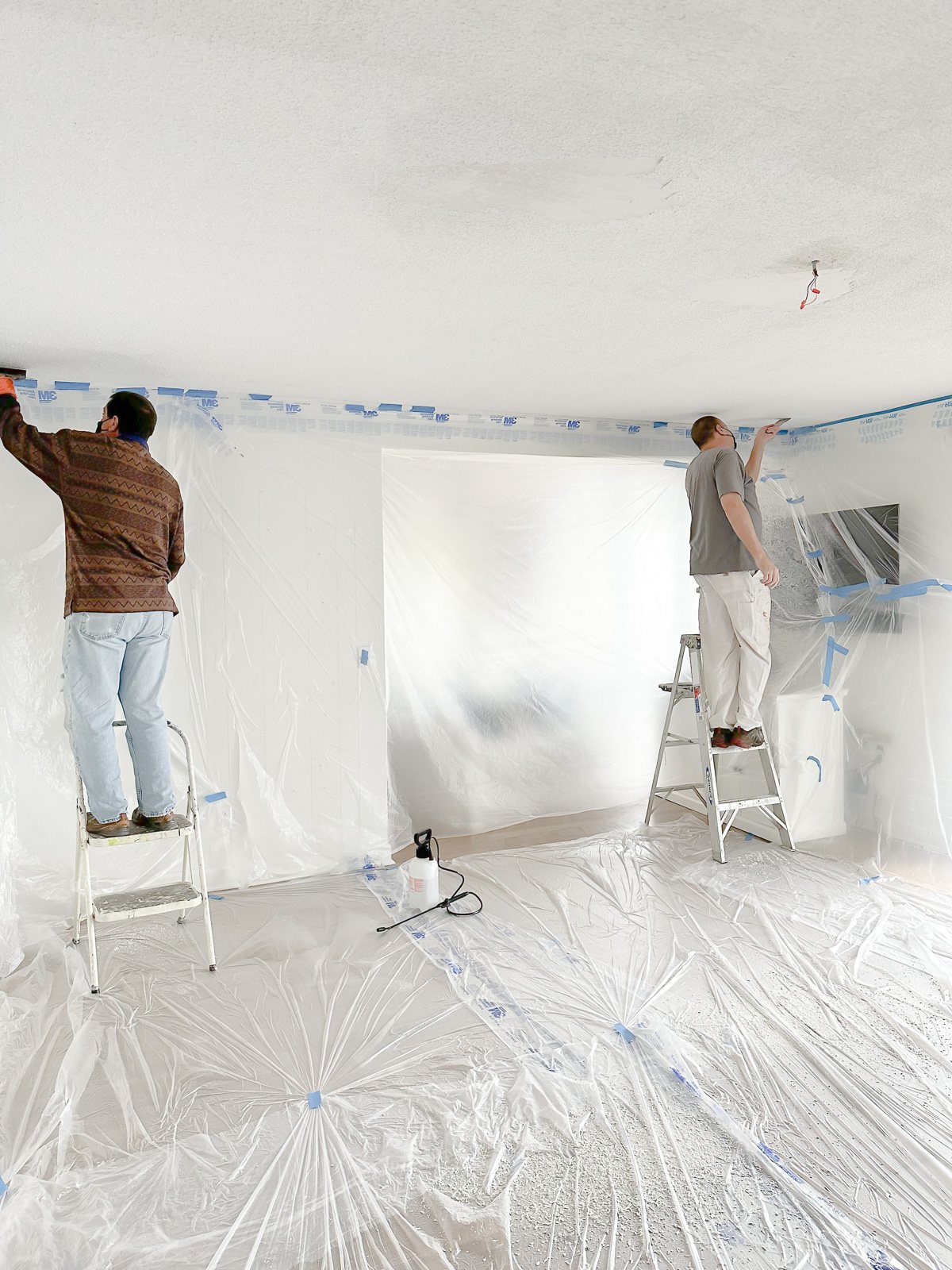 living room taped off while making over ceiling