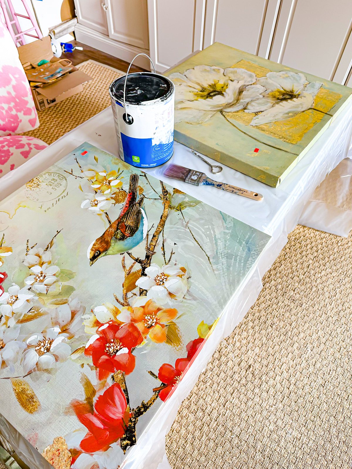 two thrift store finds - large painted canvases.