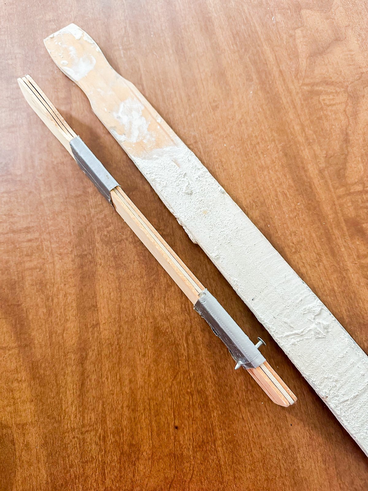 DIY wall art hangers that make hanging art easy and precise.