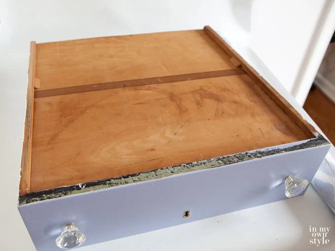 Try this trick the next time you want to line a drawer with decorative paper. No measuring tape needed.
