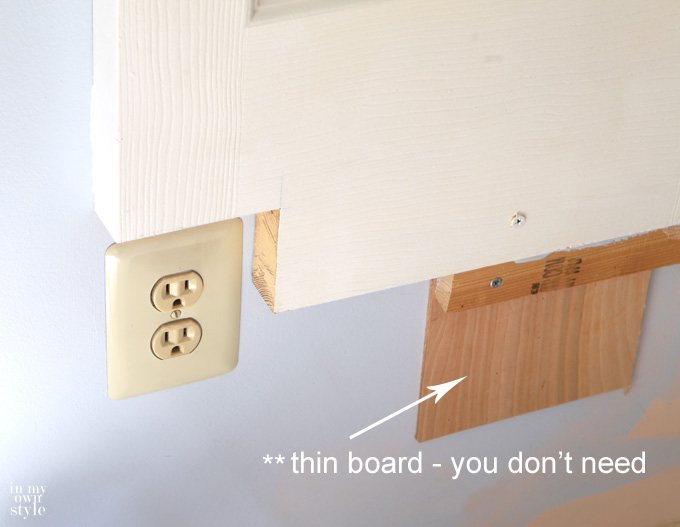 Cutting-out-door-to-fit-around-an-electrical-outlet