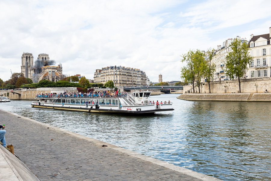 Tourist boat moving along the Seine in Paris