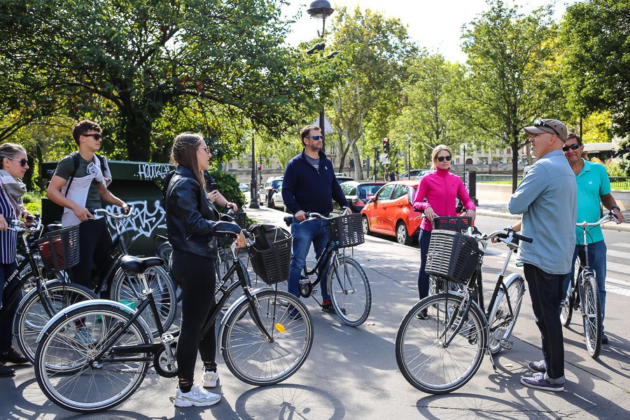 Paris Bike Tours. Bike About Tours in Paris tour guide Simon with a tour group.