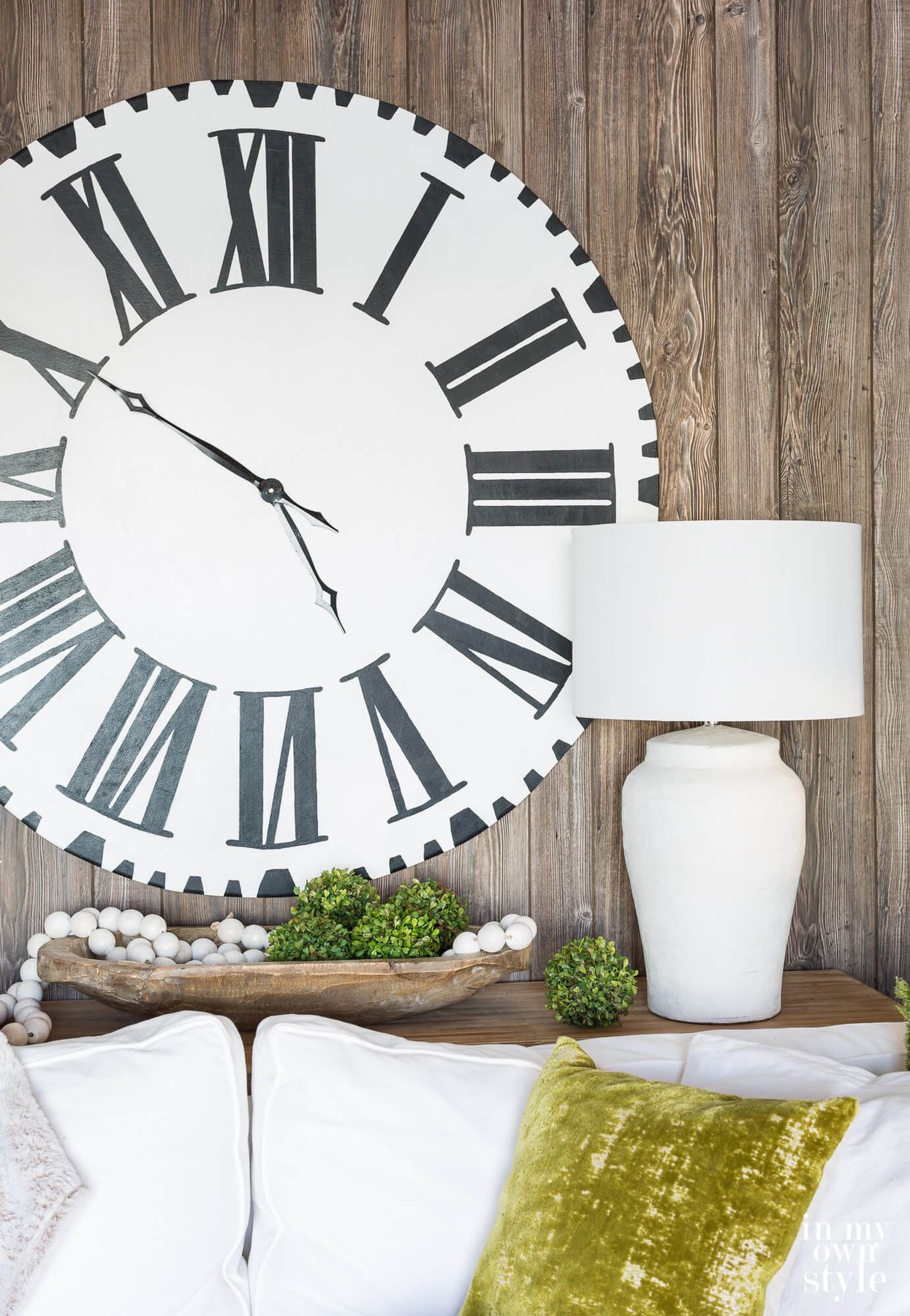 DIY makeover of an ugly table lamp. After image of the newly transformed lamp on a sofa table.