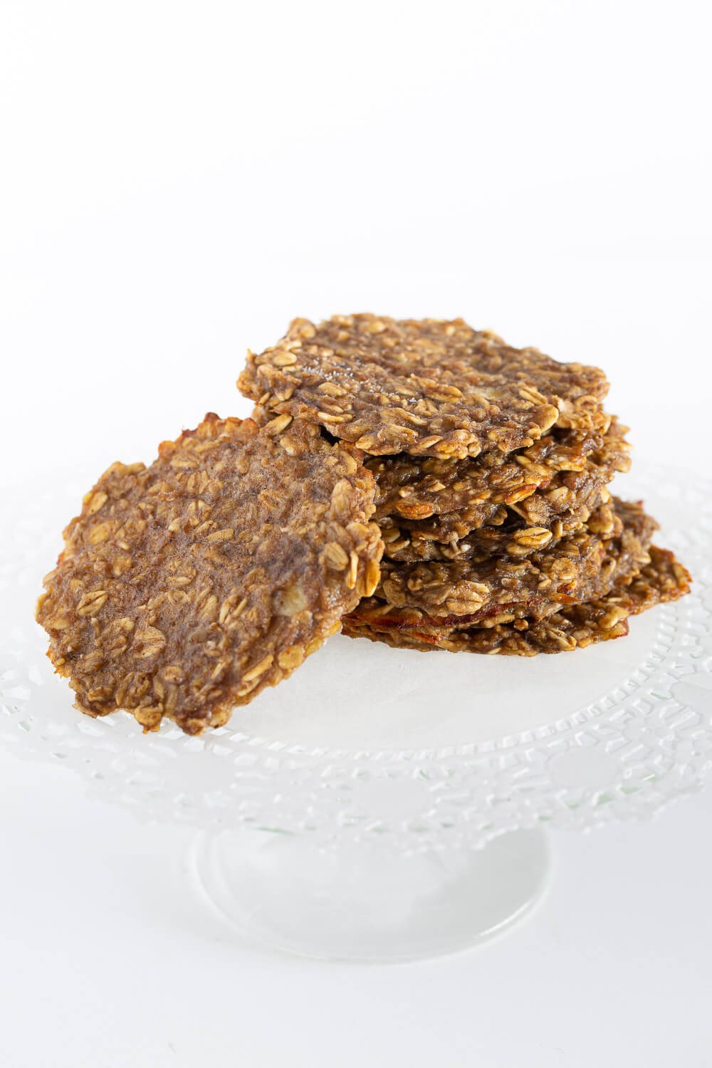 Stack of thin and crispy banana oatmeal cookies.
