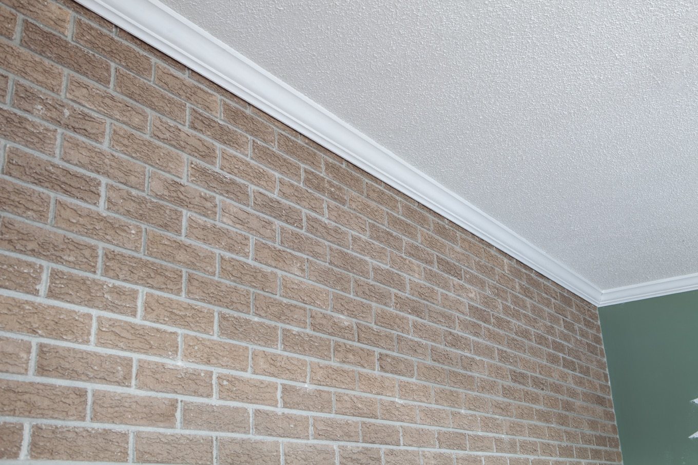 How to cover a brick wall with plank paneling