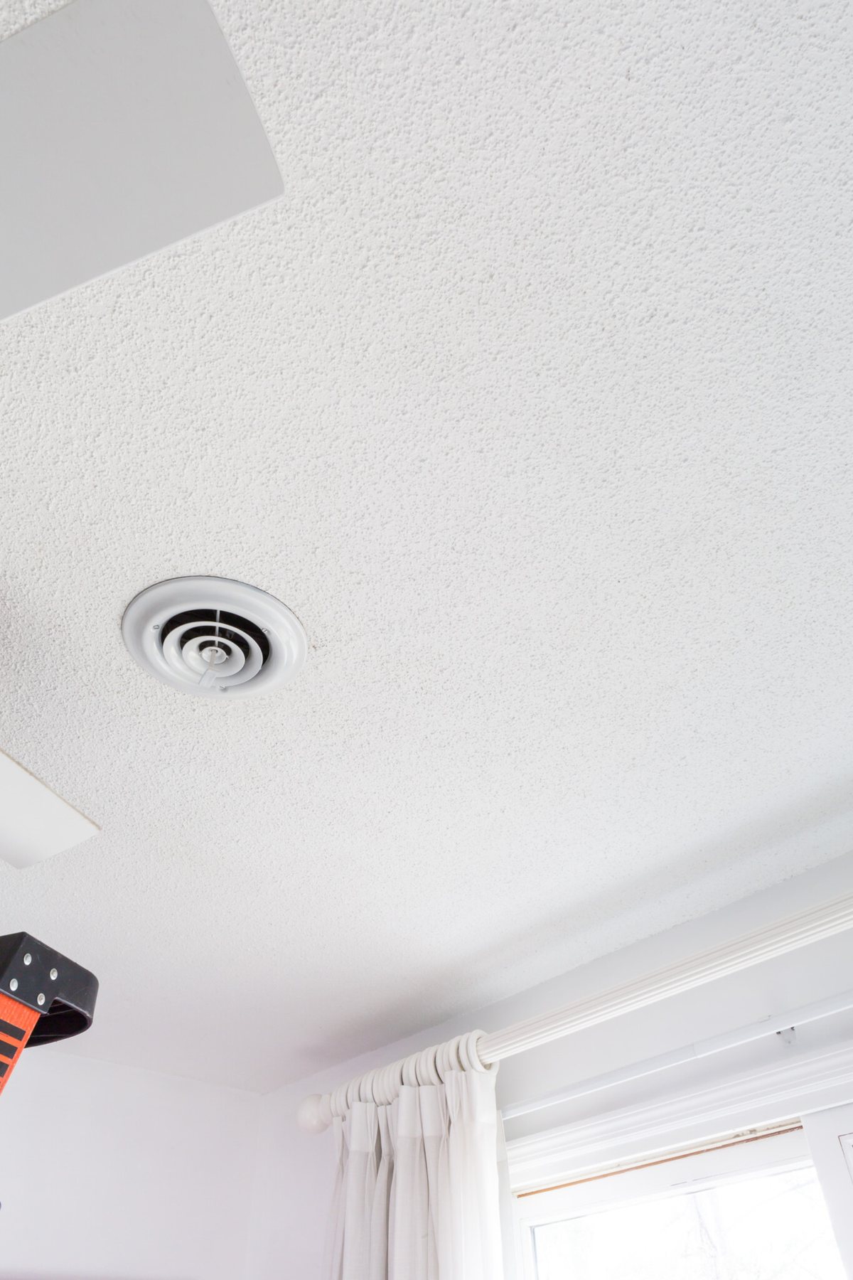 Should your remove a popcorn ceiling or cover it?