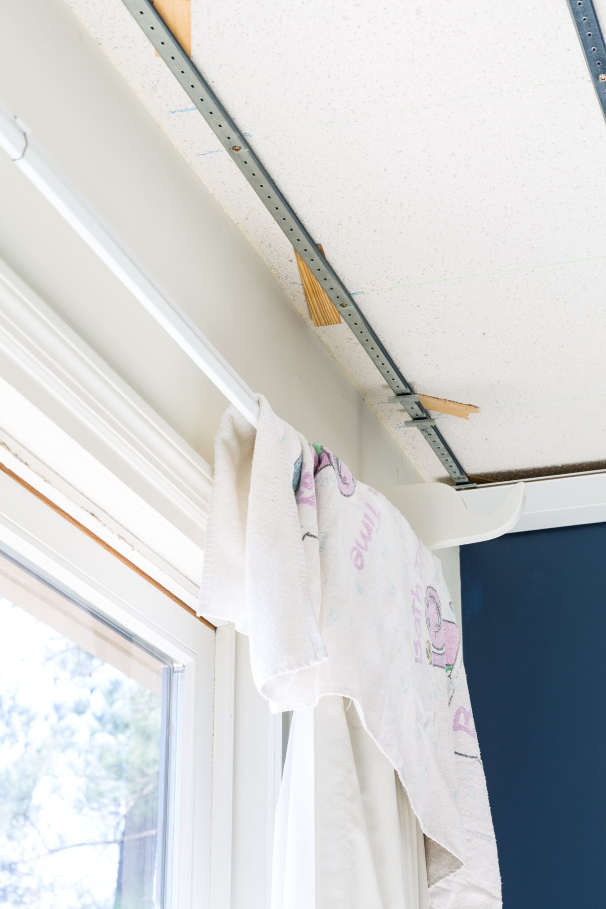 How to attach Easy Up Tracks to Ceiling when covering a textured ceiling.