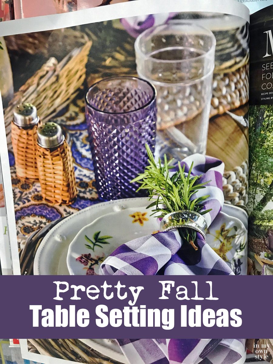 Pretty fall table setting using a purple and white color scheme.