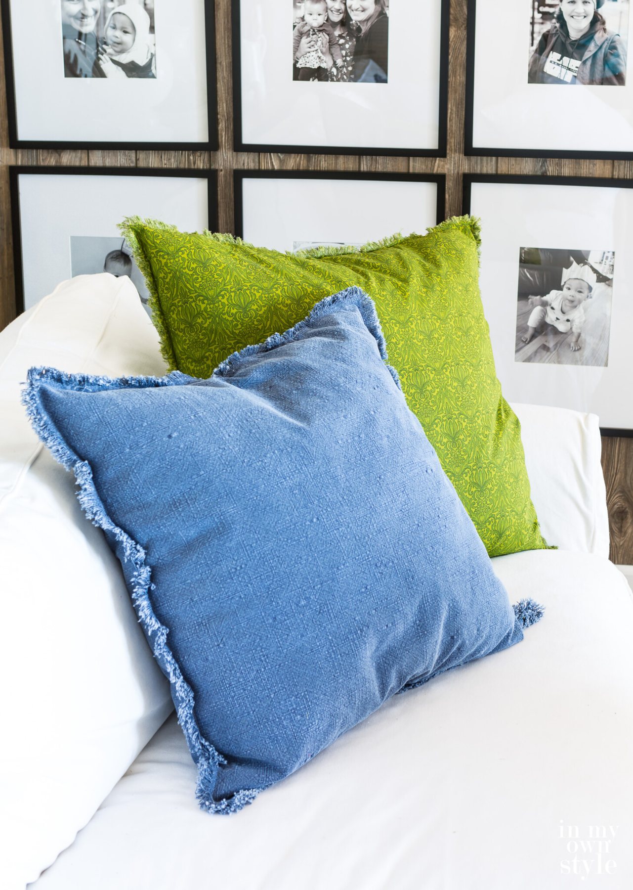 blue and green pillows on white sofa